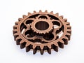 Vintage Marvel: Detailed Close-up of Intricate Brown Gear Against a Pristine White Background