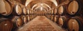 Rows of Wine Barrels in Vintage Cellar Royalty Free Stock Photo