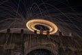 Showers of hot glowing sparks from spinning steel wool. Royalty Free Stock Photo