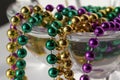 Traditional three color Mardi Gras beads abstract design with crystal glass Royalty Free Stock Photo