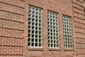 Vintage brick wall texture background with attractive glass block windows Royalty Free Stock Photo