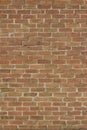 Old rustic orange brown color brick wall texture in traditional running bond brickwork pattern Royalty Free Stock Photo