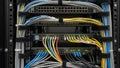 A well-organized server rack with neatly arranged network cables and equipment Royalty Free Stock Photo