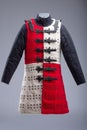 Red and White Brigandine Armor with Studs and Black Straps. Royalty Free Stock Photo