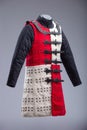 Red and White Brigandine Armor with Studs and Black Straps. Royalty Free Stock Photo