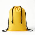 Bright yellow drawstring backpack for casual or travel use with black trim accents Royalty Free Stock Photo