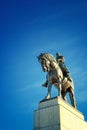 The image shows a bronze statue of a man on a horse. The horse on a tall pedestal. Monument to Jan Zizka on the top of Vitkovsky Royalty Free Stock Photo