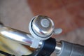 The image shows a close-up of a bicycle bell attached to the handlebars Royalty Free Stock Photo