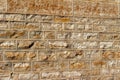 Texture background of a 19th century stone brick wall with restored mortar