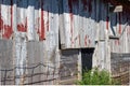 Close up view of old weathered red siding on a 19th Century wooden barn Royalty Free Stock Photo