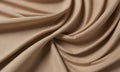 close-up view crumpled beige fabric, with slight crease visible in the center.