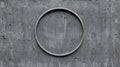 A gray concrete wall with a circular hole in the middle. Royalty Free Stock Photo