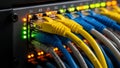 A close-up view of a network switch with colorful ethernet cables connected Royalty Free Stock Photo
