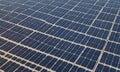 close-up view solar panel array, showcasing rows rectangular panels arranged in grid-like pattern. Royalty Free Stock Photo