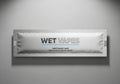 A close-up view of a wet vapes package with blue and black text on a gray background Royalty Free Stock Photo
