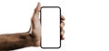 Person holding smartphone with blank screen demonstrating modern device usage in everyday life Royalty Free Stock Photo