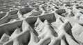 Closeup of intricate sand formation with unique natural erosion patterns in a desertlike landscape with sandy dunes and ridges Royalty Free Stock Photo