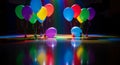 Colorful Balloons on Reflective Surface Celebration Scene Royalty Free Stock Photo