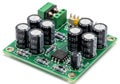 Electronic circuit board with multiple capacitors and voltage regulators for power management Royalty Free Stock Photo