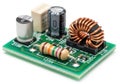 Small electronic circuit board with capacitors and inductor for power conversion Royalty Free Stock Photo