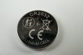 The image shows a compact, reliable CR2032 A76 button cell battery Known for its usage in electronic devices like remote Royalty Free Stock Photo