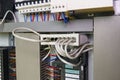 Image shows control cubicle. Multimode fiber switch and circuit breakers inside power case