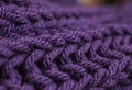 Dark volet scarf and; closeup of the pattern. Royalty Free Stock Photo