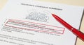insurance coverage summary with red pen Royalty Free Stock Photo