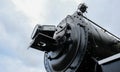 Detailed view of an old-style, American locomotive. Royalty Free Stock Photo