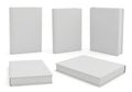 Assorted stack of blank white paper and notebooks displayed neatly isolated on white background Royalty Free Stock Photo