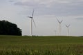 Giant wind turbines on a rural agricultural landscape