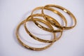 elegant gold bangles with intricate designs. gold. bangles. Royalty Free Stock Photo