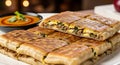 Delicious Mutabbaq Stack with Curry Dip, a Mouthwatering Arabian Treat Royalty Free Stock Photo