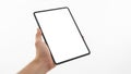 A person holding a blank tablet device against a white background Royalty Free Stock Photo