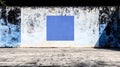 A blue square on a white wall. Royalty Free Stock Photo