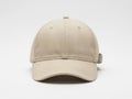 Light beige casual cap displayed against a plain background isolated on white background Royalty Free Stock Photo
