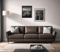 A living room with a brown leather couch, a coffee table, and a lamp on a side table. Royalty Free Stock Photo