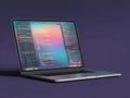 Image shows a MacBook Pro laptop on its side, displaying a vibrant interface with various app UI elements and code snippets Royalty Free Stock Photo