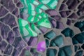 Macro texture of a mosaic pattern of colored glass pieces in ceramic ware