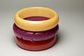 Close up view of vintage bakelite bangle bracelets on white background Royalty Free Stock Photo