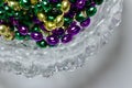 Macro abstract art texture background of bright traditional three colors of Mardi Gras beads Royalty Free Stock Photo