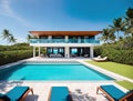 A modern beachfront house with a swimming pool and lounge chairs on the patio.