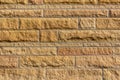 Modern limestone block wall background with beautiful rough natural texture
