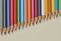 Colorful wooden colored pencils aligned diagonally on light background Royalty Free Stock Photo