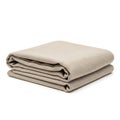 A folded beige blanket with a textured pattern Royalty Free Stock Photo