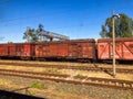 Image shows an old, rusty red train car labeled WASHOUT 2075 on a railroad scene with two parallel tracks The same Royalty Free Stock Photo