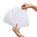 Hands holding a neatly organized stack of blank white paper sheets Royalty Free Stock Photo