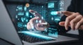 A person interacting with a futuristic digital interface on a laptop screen Royalty Free Stock Photo