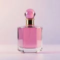 A pink perfume bottle with a gold cap and a round stopper on a white background Royalty Free Stock Photo