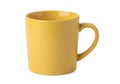 A simple ceramic mug with a smooth yellow finish and ergonomic handle Royalty Free Stock Photo